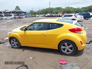 2012 Hyundai Veloster w/Black Int with VIN KMHTC6AD5CU046702, listed as a IAAI auction lot 42245379 with 136,327 mi miles and . Bid and sale history available at DreamBid. Image 14.