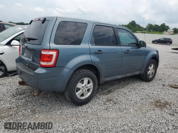2010 Ford Escape XLS with VIN 1FMCU0C78AKD44185, listed as a Copart auction lot 60876155 with 157,399 mi miles and Salvage title. Bid and sale history available at DreamBid. Image 3.