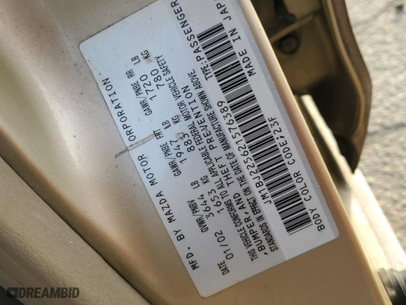 2002 Mazda Protege DX with VIN JM1BJ225621576389, listed as a Copart auction lot 42727745 with 185,042 mi miles and Salvage Title. Bid and sale history available at carsss.com. Image 14.
