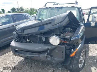 2013 Toyota FJ Cruiser with VIN JTEBU4BF2DK173157, listed as a IAAI auction lot 39718611 with 178,886 mi miles. Bid and sale history available at carsss.com. Image 6.