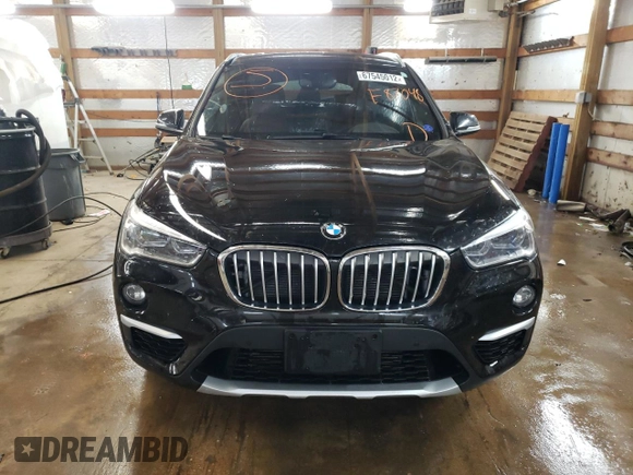 2017 BMW X1 xDrive28i with VIN WBXHT3C34H5F87048, listed as a Copart auction lot 67545012 with 76,666 mi miles. Bid and sale history available at carsss.com. Image 5.