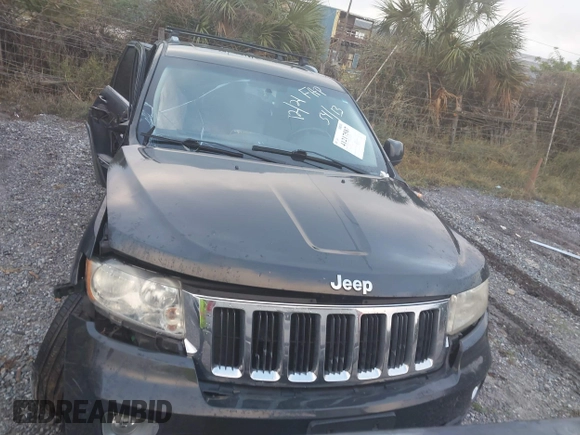 2011 Jeep Grand Cherokee Laredo z VIN 1J4RR4GG2BC737140, wystawiony jako IAAI lot #41217587 z przebiegiem Nie podano mil oraz . Historia ofert i sprzedaży dostępna na DreamBid. Obrazek 12.