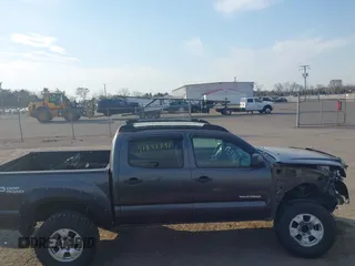 2014 Toyota Tacoma with VIN 3TMLU4EN3EM151545, listed as a IAAI auction lot 41821451 with 261,311 mi miles. Bid and sale history available at carsss.com. Image 14.