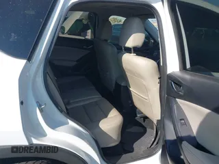 2014 Mazda CX-5 Grand Touring with VIN JM3KE4DY4E0375809, listed as a IAAI auction lot 41468078 with 151,226 mi miles. Bid and sale history available at carsss.com. Image 8.