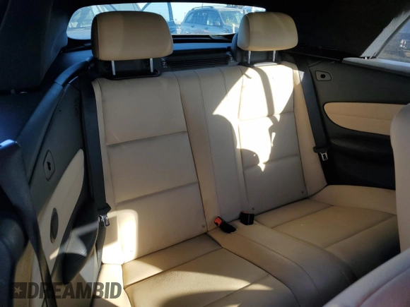 2010 BMW 1 Series 128i with VIN WBAUN1C56AVH82146, listed as a Copart auction lot 79296544 with 79,976 mi miles and Salvage title. Bid and sale history available at DreamBid. Image 10.