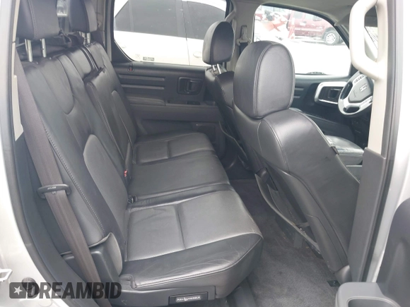 2006 Honda Ridgeline RTL with VIN 2HJYK16566H532598, listed as a IAAI auction lot 42184828 with 91,817 mi miles and . Bid and sale history available at DreamBid. Image 8.
