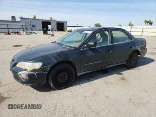 1999 Honda Accord LX z VIN JHMCG6654XC007300, wystawiony jako Copart lot #58746375 z przebiegiem 223 158 mil mil oraz Szkoda całkowita • Salvage title. Historia ofert i sprzedaży dostępna na DreamBid. Obrazek 1.