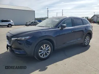 2016 Mazda CX-9 Touring z VIN JM3TCACY4G0125452, wystawiony jako Copart lot #53974205 z przebiegiem 117 178 mil mil oraz Szkoda całkowita • Salvage title. Historia ofert i sprzedaży dostępna na DreamBid. Obrazek 1.