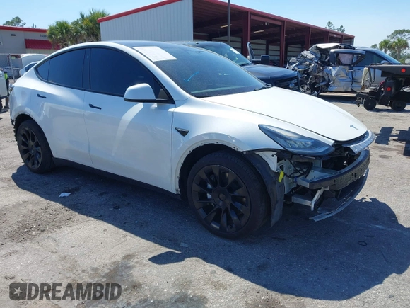 2022 Tesla Model Y Long Range with VIN 7SAYGAEE8NF431786, listed as a IAAI auction lot 41750353 with 67,846 mi miles and . Bid and sale history available at carsss.com. Image 1.