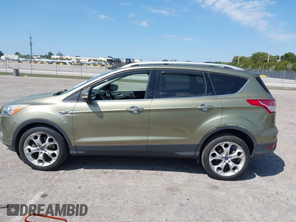 2013 Ford Escape Titanium with VIN 1FMCU0J94DUB06332, listed as a IAAI auction lot 41824742 with 92,633 mi miles. Bid and sale history available at carsss.com. Image 14.