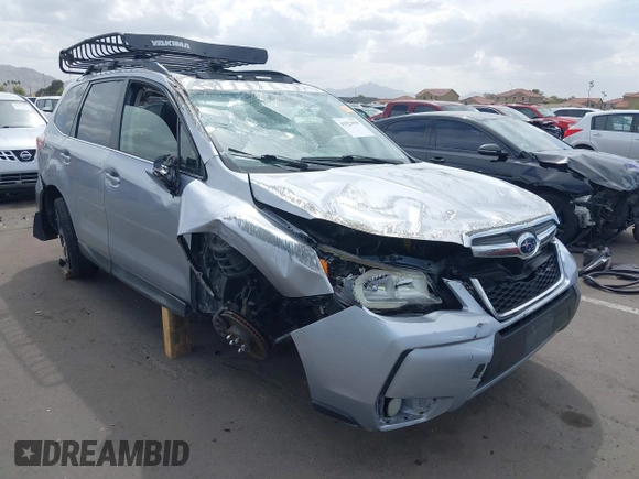 2014 Subaru Forester XT Touring with VIN JF2SJGPC2EH458390, listed as a IAAI auction lot 41923959 with 113,170 mi miles and . Bid and sale history available at DreamBid. Image 6.
