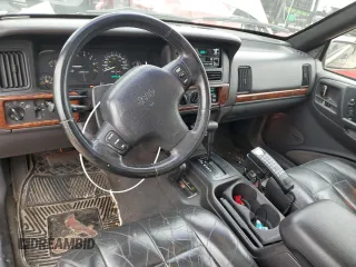 1997 Jeep Grand Cherokee Limited with VIN 1J4GZ78Y3VC568413, listed as a Copart auction lot 86171124 with 104,558 mi miles and Salvage Title. Bid and sale history available at carsss.com. Image 8.