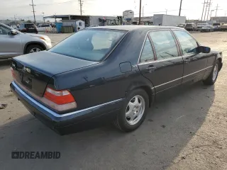 1999 Mercedes-Benz S with VIN WDBGA57G5XA428158, listed as a Copart auction lot 65543515 with 65,698 mi miles and Salvage title. Bid and sale history available at DreamBid. Image 3.