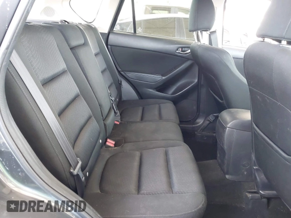 2014 Mazda CX-5 Touring with VIN JM3KE2CY9E0384401, listed as a IAAI auction lot 41699913 with 75,301 mi miles. Bid and sale history available at carsss.com. Image 8.
