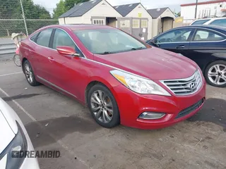 2013 Hyundai Azera z VIN KMHFG4JG4DA250183, wystawiony jako IAAI lot #42511640 z przebiegiem 203 868 mil mil oraz . Historia ofert i sprzedaży dostępna na DreamBid. Obrazek 1.