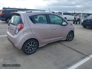 2013 Chevrolet Spark LT with VIN KL8CF6S99DC626296, listed as a IAAI auction lot 42047123 with 63,669 mi miles. Bid and sale history available at carsss.com. Image 4.