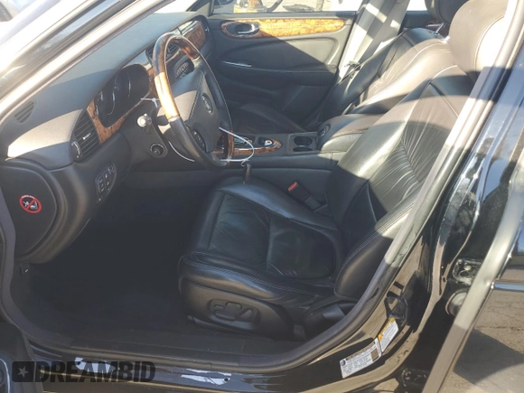 2005 Jaguar XJ Vanden Plas z VIN SAJWA82C75SG45094, wystawiony jako Copart lot #83891564 z przebiegiem 57 467 mil mil oraz Szkoda całkowita • Salvage title. Historia ofert i sprzedaży dostępna na DreamBid. Obrazek 7.