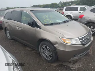 2011 Honda Odyssey EX-L with VIN 5FNRL5H68BB054204, listed as a IAAI auction lot 42576248 with Not provided miles and . Bid and sale history available at DreamBid. Image 1.