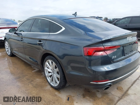 2018 Audi A5 Sportback Premium z VIN WAUANCF5XJA022221, wystawiony jako IAAI lot #42041410 z przebiegiem 94 851 mil mil oraz . Historia ofert i sprzedaży dostępna na DreamBid. Obrazek 3.