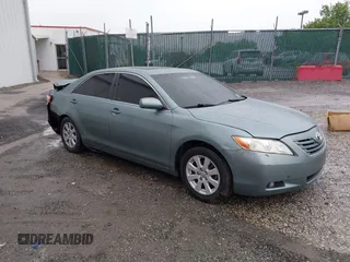 2007 Toyota Camry CE z VIN 4T1BE46K37U716769, wystawiony jako IAAI lot #42233779 z przebiegiem 166 265 mil mil oraz . Historia ofert i sprzedaży dostępna na DreamBid. Obrazek 1.