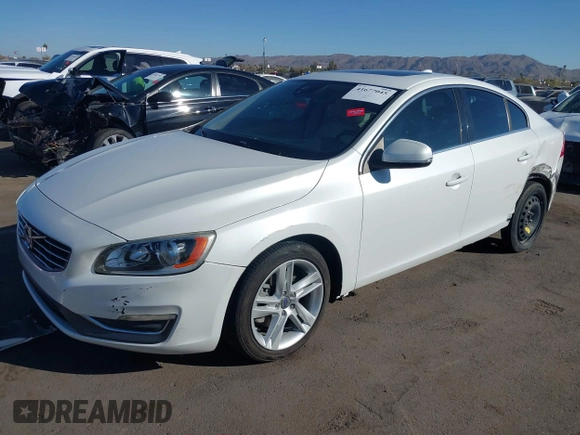2015 Volvo S60 T5 Drive-E Premier z VIN YV140MFB4F2301427, wystawiony jako IAAI lot #41677045 z przebiegiem 103 262 mil mil oraz . Historia ofert i sprzedaży dostępna na DreamBid. Obrazek 18.