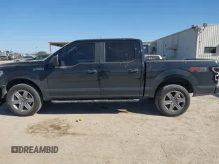 2018 Ford F-150 XL with VIN 1FTEW1E50JKE13640, listed as a IAAI auction lot 41228537 with 146,927 mi miles. Bid and sale history available at carsss.com. Image 14.