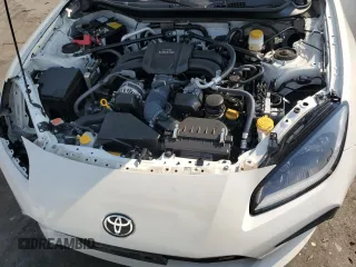 2023 Toyota GR86 with VIN JF1ZNBC11P8757595, listed as a Copart auction lot 69376574 with 34,450 mi miles and Salvage Title. Bid and sale history available at carsss.com. Image 11.