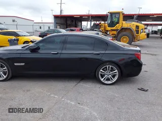 2014 BMW 7 Series 740Li with VIN WBAYE4C51ED138744, listed as a IAAI auction lot 42254213 with 116,157 mi miles and . Bid and sale history available at DreamBid. Image 14.