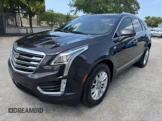 2019 Cadillac XT5 FWD z VIN 1GYKNARSXKZ106582, wystawiony jako Copart lot #60296075 z przebiegiem 88 728 mil mil oraz Nie do naprawy • Non repairable. Historia ofert i sprzedaży dostępna na DreamBid. Obrazek 1.