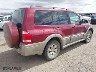 2004 Mitsubishi Montero LTD with VIN JA4MW51S04J008915, listed as a IAAI auction lot 41797432 with 187,660 mi miles. Bid and sale history available at carsss.com. Image 4.