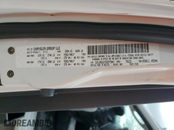 2013 Ram 1500 Tradesman z VIN 3C6JR6DG7DG577041, wystawiony jako Copart lot #70975954 z przebiegiem Nie podano mil oraz Szkoda całkowita • Salvage title. Historia ofert i sprzedaży dostępna na DreamBid. Obrazek 12.