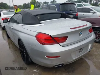 2012 BMW 6 Series 650i with VIN WBALZ3C5XCDL71723, listed as a IAAI auction lot 42204721 with 132,912 mi miles and . Bid and sale history available at carsss.com. Image 3.