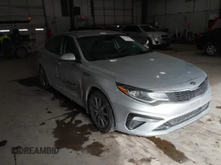 2019 Kia Optima LX with VIN 5XXGT4L39KG354118, listed as a IAAI auction lot 41621171 with 96,441 mi miles. Bid and sale history available at carsss.com. Image 1.