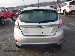 2019 Ford Fiesta SE z VIN 3FADP4EJ7KM147864, wystawiony jako IAAI lot #41692160 z przebiegiem 87 417 mil mil oraz . Historia ofert i sprzedaży dostępna na DreamBid. Obrazek 16.