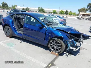 2023 Tesla Model 3 z VIN 5YJ3E1EA2PF506429, wystawiony jako IAAI lot #42320628 z przebiegiem Nie podano mil oraz . Historia ofert i sprzedaży dostępna na DreamBid. Obrazek 1.