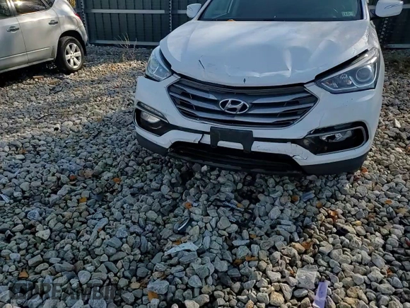 2017 Hyundai Santa Fe 2.0T z VIN 5XYZUDLA3HG397569, wystawiony jako Copart lot #77360944 z przebiegiem 145 512 mil mil oraz Szkoda całkowita • Salvage title. Historia ofert i sprzedaży dostępna na DreamBid. Obrazek 12.