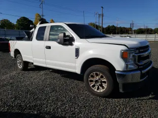 2022 Ford F-250 XL with VIN 1FT7X2B63NEG34856, listed as a Copart auction lot 70211314 with 30,919 mi miles and Salvage Title. Bid and sale history available at DreamBid. Image 4.