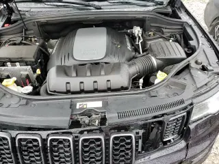 2018 Jeep Grand Cherokee Overland with VIN 1C4RJFCT3JC268599, listed as a Copart auction lot 85242404 with 58,018 mi miles and Salvage title. Bid and sale history available at DreamBid. Image 14.