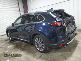2023 Mazda CX-9 Grand Touring with VIN JM3TCBDY1P0630868, listed as a Copart auction lot 56321205 with 50,427 mi miles and Salvage title. Bid and sale history available at DreamBid. Image 2.