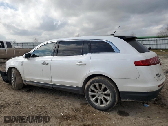 2014 Lincoln MKT with VIN 2LMHJ5FK3EBL54865, listed as a Copart auction lot 43979445 with 54,820 mi miles and Salvage Title. Bid and sale history available at DreamBid. Image 2.