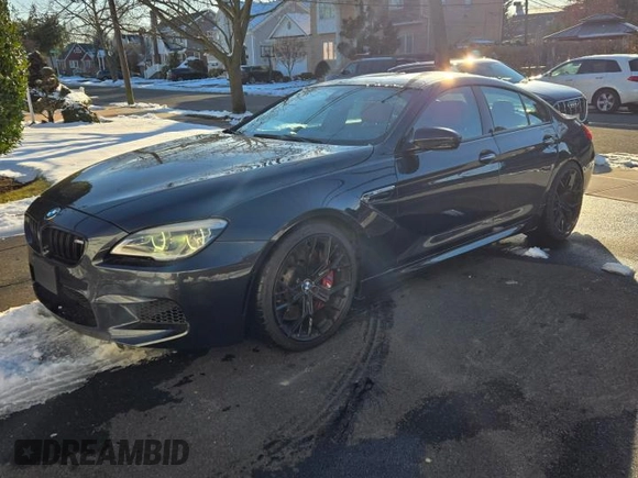 2016 BMW M6 z VIN WBS6E9C57GG437138, wystawiony jako Copart lot #45290525 z przebiegiem 58 645 mil mil oraz Tytuł czysty. Historia ofert i sprzedaży dostępna na DreamBid. Obrazek 2.