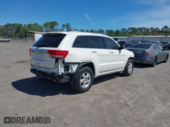 2011 Jeep Grand Cherokee Laredo with VIN 1J4RS4GG0BC573388, listed as a IAAI auction lot 41875998 with Not Provided miles and . Bid and sale history available at DreamBid. Image 4.