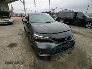 2023 Honda Civic EX z VIN 2HGFE1F72PH312995, wystawiony jako Copart lot #57284305 z przebiegiem 7 921 mil mil oraz Szkoda całkowita • Salvage title. Historia ofert i sprzedaży dostępna na DreamBid. Obrazek 13.
