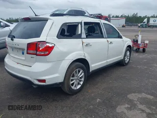 2017 Dodge Journey SXT with VIN 3C4PDDBG3HT592061, listed as a IAAI auction lot 38299155 with 127,856 mi miles and . Bid and sale history available at DreamBid. Image 4.