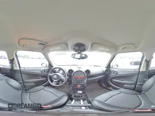 2015 MINI Countryman S with VIN WMWZC3C51FWP52784, listed as a Copart auction lot 58366455 with 78,432 mi miles and Salvage title. Bid and sale history available at DreamBid. Image 14.