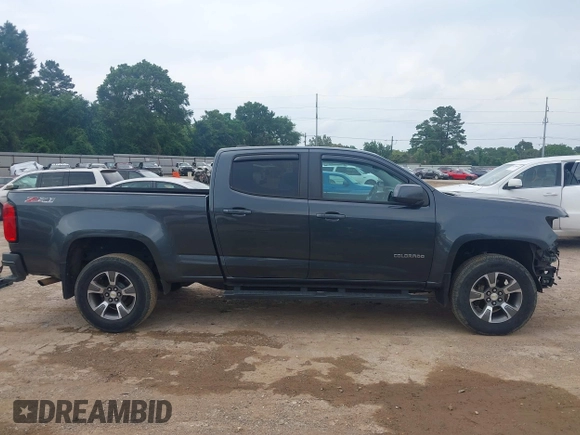 2015 Chevrolet Colorado 4WD Z71 with VIN 1GCGTCE35F1270760, listed as a IAAI auction lot 42279531 with 172,821 mi miles and . Bid and sale history available at DreamBid. Image 14.