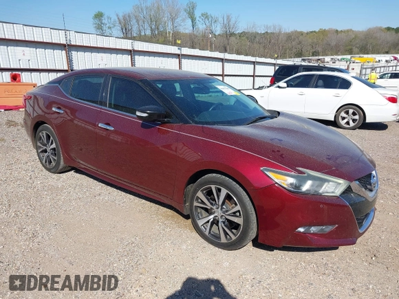 2016 Nissan Maxima Platinum z VIN 1N4AA6AP1GC416590, wystawiony jako IAAI lot #41817288 z przebiegiem 248 514 mil mil oraz . Historia ofert i sprzedaży dostępna na DreamBid. Obrazek 1.