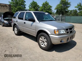 2004 Isuzu Rodeo z VIN 4S2DM58Y144302204, wystawiony jako Copart lot #59227675 z przebiegiem 98 998 mil mil oraz Czysty tytuł • Clean title. Historia ofert i sprzedaży dostępna na DreamBid. Obrazek 4.