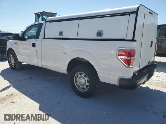 2014 Ford F-150 XL with VIN 1FTMF1CM4EKD33317, listed as a Copart auction lot 50059765 with 188,709 mi miles and Salvage title. Bid and sale history available at DreamBid. Image 2.