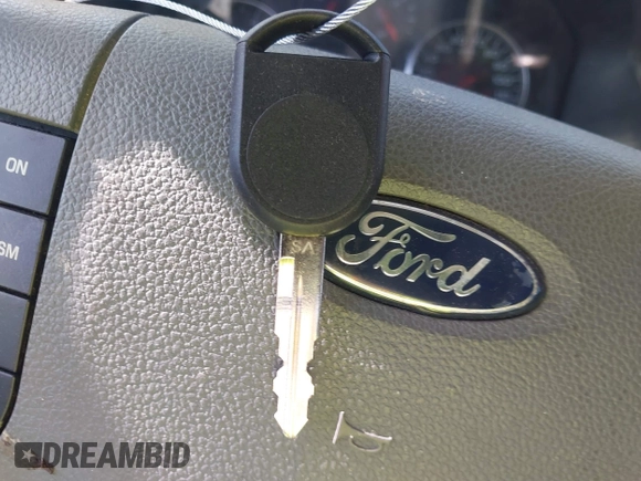 2007 Ford Five Hundred SEL z VIN 1FAHP27157G152811, wystawiony jako IAAI lot #41843996 z przebiegiem Nie podano mil oraz . Historia ofert i sprzedaży dostępna na DreamBid. Obrazek 11.